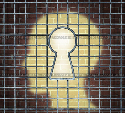 Creative freedom key with a human head light glowing on a brick wall through a prison cage opened with a keyhole shape as a business and mental health concept searching for innovative solutions to be set free for success. Стоковое фото, агентство Ingram Publishing / Фотобанк Лори