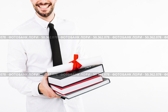 crop man with books diploma. Стоковое фото, агентство Ingram Publishing / Фотобанк Лори
