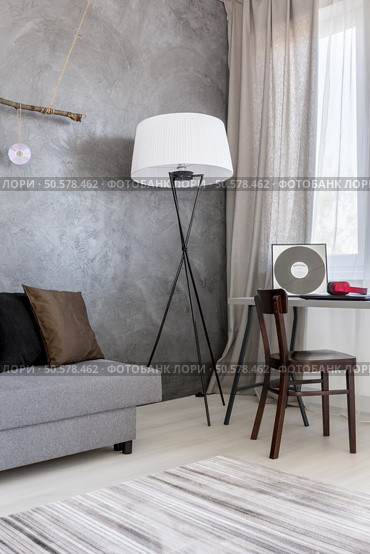 Cropped shot of a modern living room designed in natural colors. Стоковое фото, агентство Ingram Publishing / Фотобанк Лори