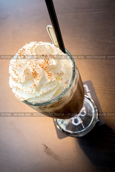 Cup of iced mocha coffee with whipping cream. Стоковое фото, агентство Ingram Publishing / Фотобанк Лори