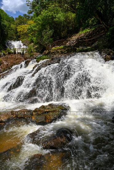 Datanla Waterfall in Dalat among the green rainforests in Southeastern Vietnam. Стоковое фото, фотограф Сергей Фролов / Фотобанк Лори