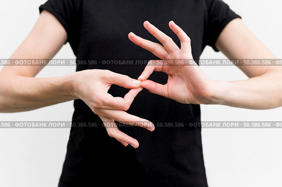 deaf woman communicating through sign language. Стоковое фото, агентство Ingram Publishing / Фотобанк Лори