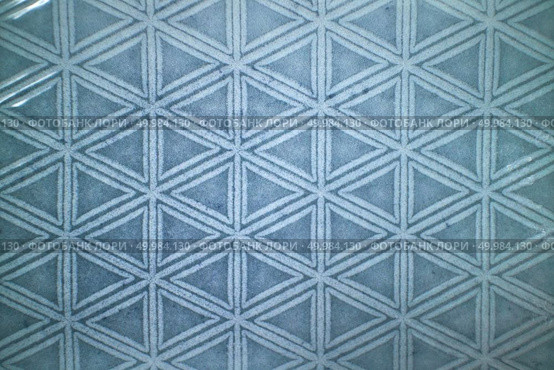 Decorative ceramic blue tile with figured pattern.Can used for design or background. Decorative ceramic blue tile with figured pattern. Стоковое фото, агентство Ingram Publishing / Фотобанк Лори