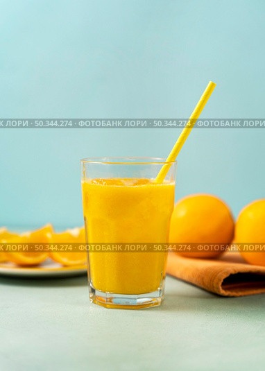 delicious drink glass with straw. Стоковое фото, агентство Ingram Publishing / Фотобанк Лори