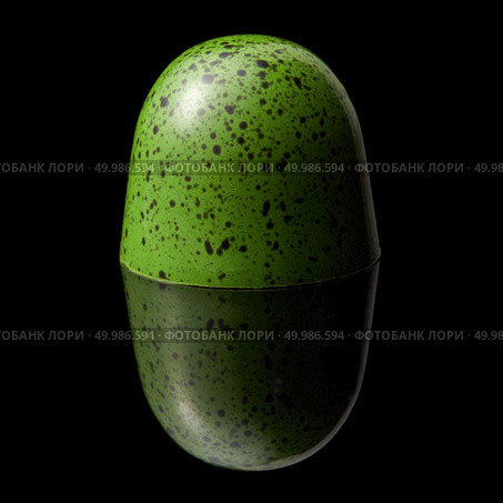 delicious green chocolate candy on a black background. chocolate candy on black background. Стоковое фото, агентство Ingram Publishing / Фотобанк Лори