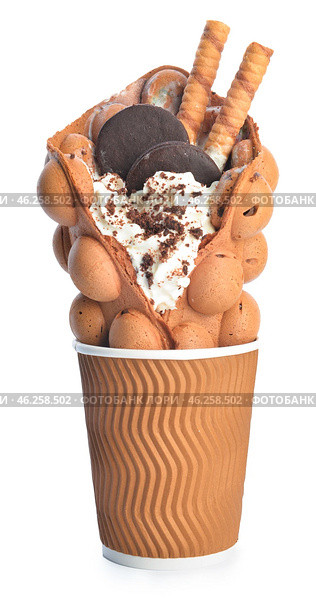 Delicious sweet bubble waffle in cup on white background. Стоковое фото, фотограф Pixel_shot / Фотобанк Лори