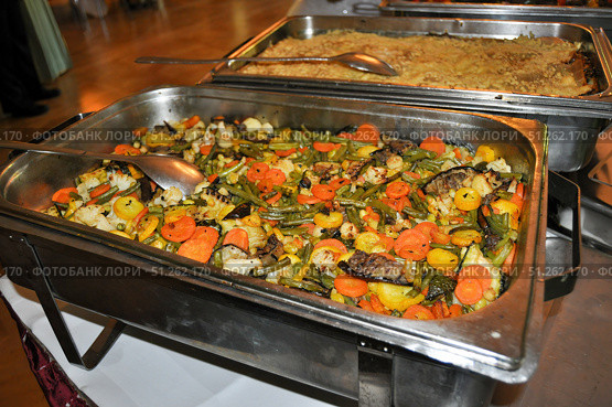 Delicious vegetable pan at the wedding. Стоковое фото, фотограф Sergakoff / Фотобанк Лори