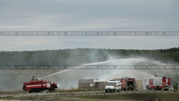 Демонстрация работы пожарной бригады на полигоне Старатель. Выставка "Оборона и защита 2012", город Нижний Тагил (2013 год). Редакционное видео, видеограф Игорь Долгов / Фотобанк Лори