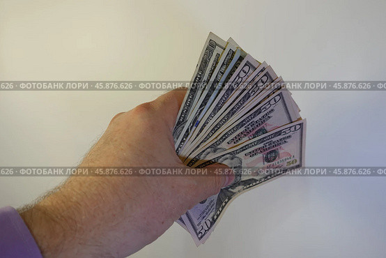 Деньги в руке. Money in hand. Стоковое фото, фотограф Юрий Пуликов / Фотобанк Лори