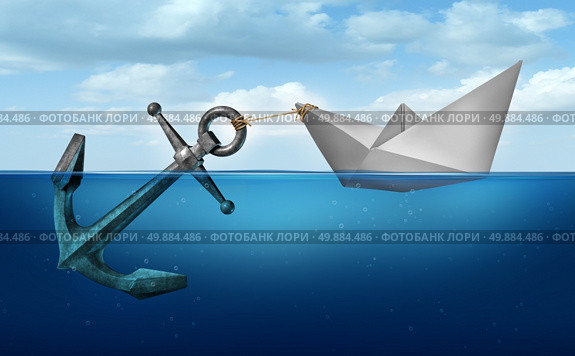 Determination concept business concept as a paper boat  in water pulling a heavy metal anchor as an independence and resolve symbol. Стоковое фото, агентство Ingram Publishing / Фотобанк Лори