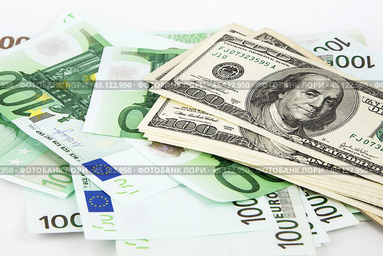 Доллары и евро на белом фоне. Крупный план.  money, euro and dollars on a white background. Стоковое фото, фотограф Лариса Гордеева / Фотобанк Лори