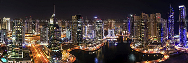 Dubai marina skyscrapers during night hours. Стоковое фото, агентство Ingram Publishing / Фотобанк Лори