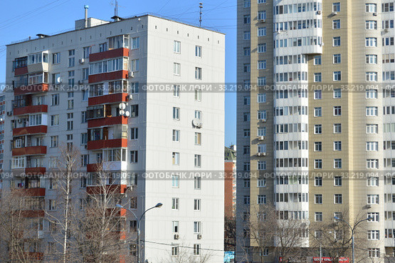 Двенадцатиэтажный блочный жилой дом II-18-31/12А. Улица Яблочкова, 21. Двадцатипятиэтажный монолитный жилой дом (жилой комплекс «Воронцовский посад»). Улица Яблочкова, 16. Бутырский район. Город Москва (2015 год). Редакционное фото, фотограф lana1501 / Фотобанк Лори