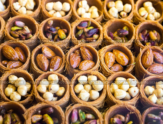 Eastern sweets in a wide range, baklava, Turkish delight. Стоковое фото, агентство Ingram Publishing / Фотобанк Лори