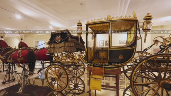 Elaborate gilded horse harnesses decorated with Bulgarian coat of arms, crafted for Prince Ferdinand in 1893 displayed exhibited at Sofia Regional History Museum. Редакционное видео, видеограф Яков Филимонов / Фотобанк Лори