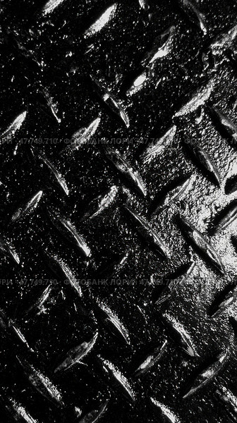 Элегантная индустриальная эстетика: блестящая черная металлическая ромбовидная текстура для современного дизайна. Стоковое AI-изображение, AI-художник ФотоИнтеллект / Фотобанк Лори