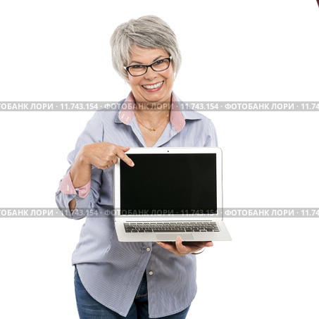 Ellderly woman working with a laptop. Стоковое фото, фотограф Erik Reis / PantherMedia / Фотобанк Лори