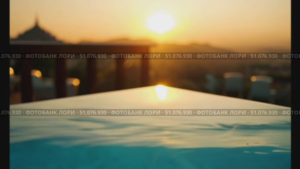 Enjoy a breathtaking sunset as the sun sets behind mountains at a serene location. Стоковое AI-видео, аниматор Данила Большаков / Фотобанк Лори