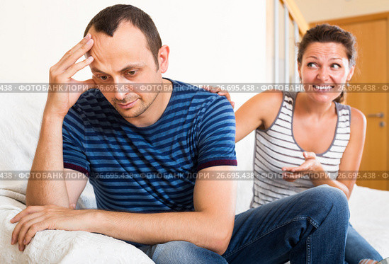 Family couple having serious conversation. Стоковое фото, фотограф Яков Филимонов / Фотобанк Лори