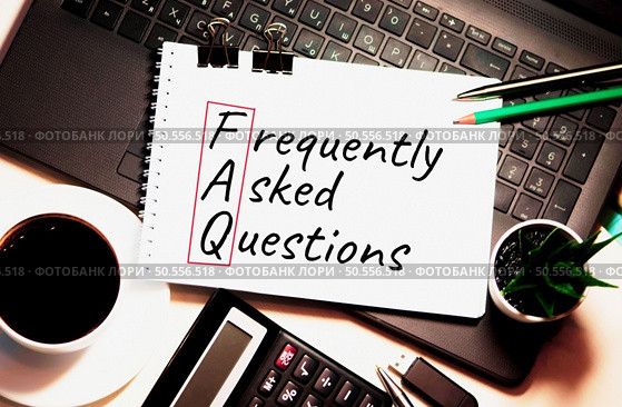 FAQ word is written on white piece of paper. Стоковое фото, агентство Ingram Publishing / Фотобанк Лори