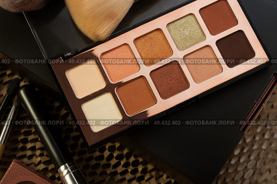 fashion set of new cosmetics palette. close up. Стоковое фото, агентство Ingram Publishing / Фотобанк Лори