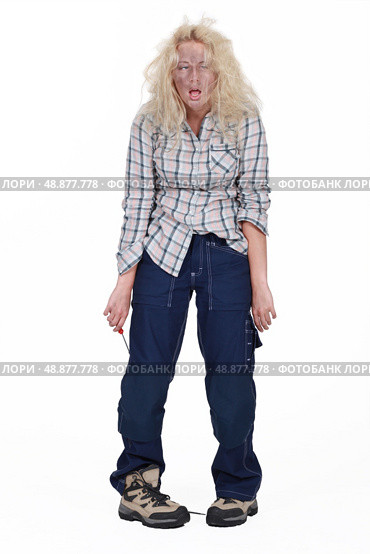 female electrician having an accident. Стоковое фото, агентство Ingram Publishing / Фотобанк Лори