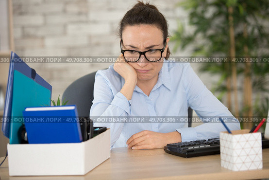 female employee being fired from her work. Стоковое фото, агентство Ingram Publishing / Фотобанк Лори