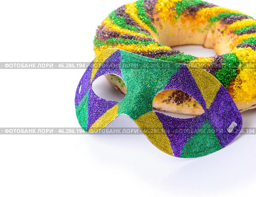 Festive cake for Mardi Gras (Fat Tuesday) holiday with mask on white background. Стоковое фото, фотограф Pixel_shot / Фотобанк Лори