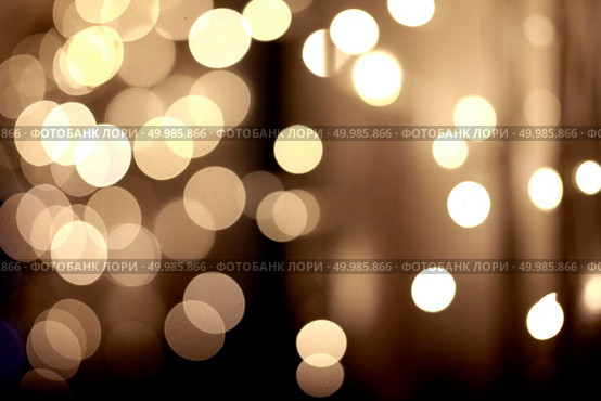 festive christmas yellow light, background bokeh. festive golden bokeh background. Стоковое фото, агентство Ingram Publishing / Фотобанк Лори