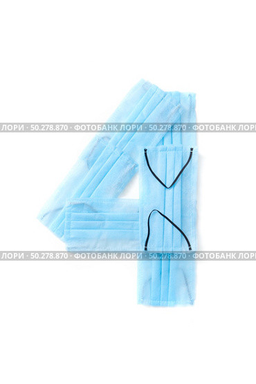 Figure 4, four handmade from medical antibacterial protective blue face masks on a white background, copy space. Creative typeface for making up new numerical information.. Number four made from protective medical masks on a white background. Стоковое фото, агентство Ingram Publishing / Фотобанк Лори