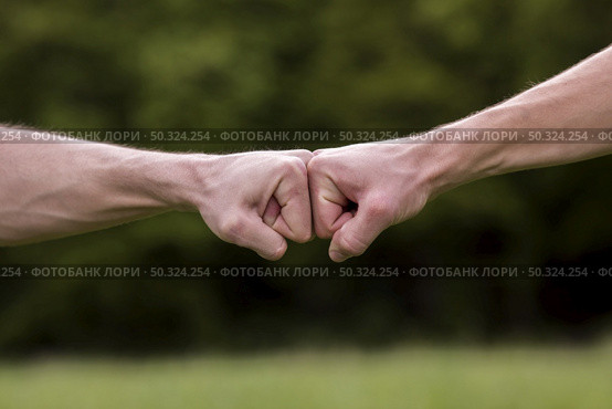 fist bump welcome gesture. Стоковое фото, агентство Ingram Publishing / Фотобанк Лори