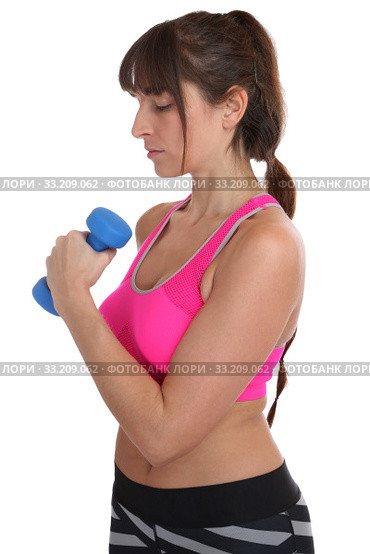Fitness Concentration Workout Woman At Exercise Training with Dumbbell Freeman. Стоковое фото, фотограф Markus Mainka / Smarterpix / Фотобанк Лори