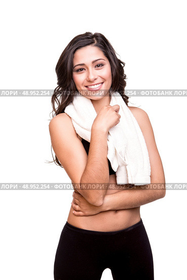 Fitness woman wiping sweat with a towel. Стоковое фото, агентство Ingram Publishing / Фотобанк Лори