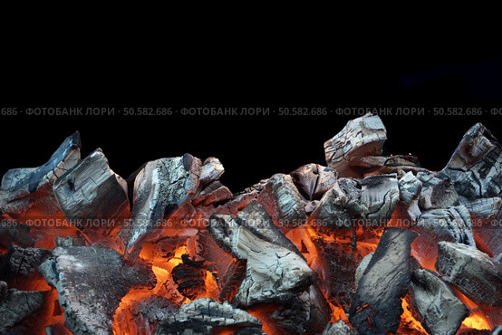 Flaming Charcoal In BBQ Grill Pit Isolated On Black Background. Стоковое фото, агентство Ingram Publishing / Фотобанк Лори