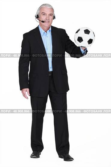Football commentator. Стоковое фото, агентство Ingram Publishing / Фотобанк Лори