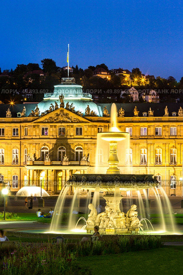 Fountain at neues Schloss New palace in Stuttgart city center, Germany at dusk. Стоковое фото, агентство Ingram Publishing / Фотобанк Лори