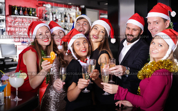 Friends on new year eve party in bar. Стоковое фото, фотограф Яков Филимонов / Фотобанк Лори