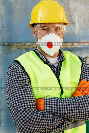 front view male worker with protective glasses reflective vest. Стоковое фото, агентство Ingram Publishing / Фотобанк Лори