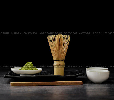front view matcha tea with bamboo whisk. Стоковое фото, агентство Ingram Publishing / Фотобанк Лори