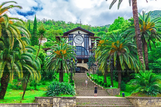 Gagra, Republik of Abkhazia - June 25, 2023: Gagripsh restaurant. Landmark of Abkhazia, restaurant with clock in Gagra. Редакционное фото, фотограф Елена Серебрякова / Фотобанк Лори