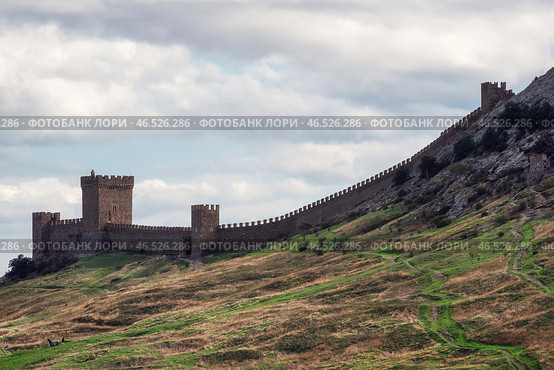Genoese fortress in the resort town of Sudak in the Crimea. Стоковое фото, фотограф Саблин Станислав / Фотобанк Лори