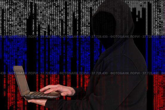 Гипотетический хакер в капюшоне на фоне российского флага, сформированного символами в стиле Matrix. Стоковое фото, фотограф Nikolay Pestov / Фотобанк Лори