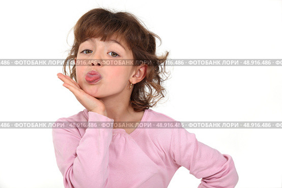 Girl sticking out her tongue. Стоковое фото, агентство Ingram Publishing / Фотобанк Лори