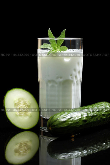 Glass of milk with fresh cucumber. Стоковое AI-изображение, AI-художник Veniamin Kraskov / Фотобанк Лори