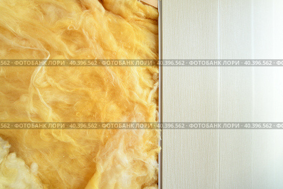 Glass wool - the thermal insulation material under PVC panels. Стоковое фото, фотограф Володина Ольга / Фотобанк Лори