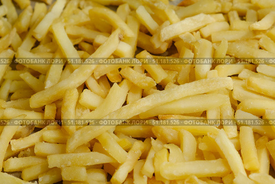 Golden french fries background. Fast food. Стоковое фото, фотограф Маргарита Кирьякова / Фотобанк Лори