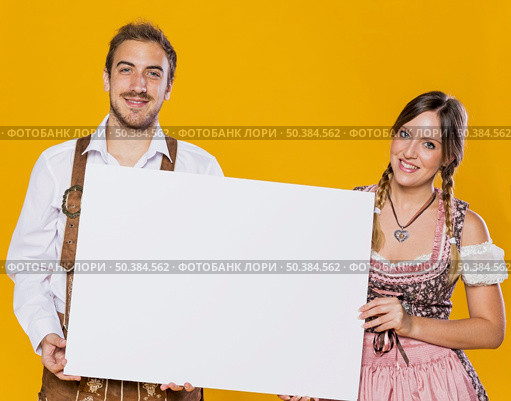 gorgeous bavarian couple together. Стоковое фото, агентство Ingram Publishing / Фотобанк Лори