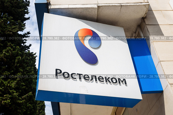 Город Сочи, Краснодарский край, Россия. . Вывеска "Ростелеком" на фасаде здания на улице Воровского (2018 год). Редакционное фото, фотограф Игорь Низов / Фотобанк Лори