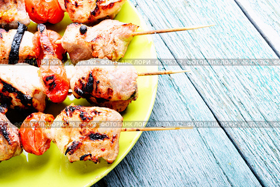 Grilled shish kebab or shashlik on skewers.Fast food.BBQ. Grilled meat skewers, shish kebab. Стоковое фото, агентство Ingram Publishing / Фотобанк Лори
