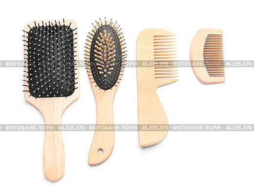 Hair brushes and combs on white background. Стоковое фото, фотограф Pixel_shot / Фотобанк Лори